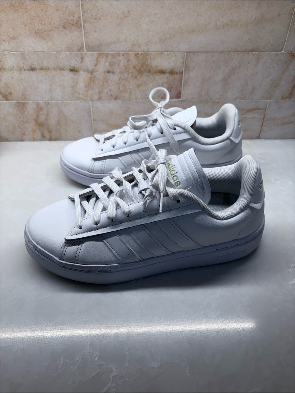 adidas All-White Low-Top Leather Sneakers